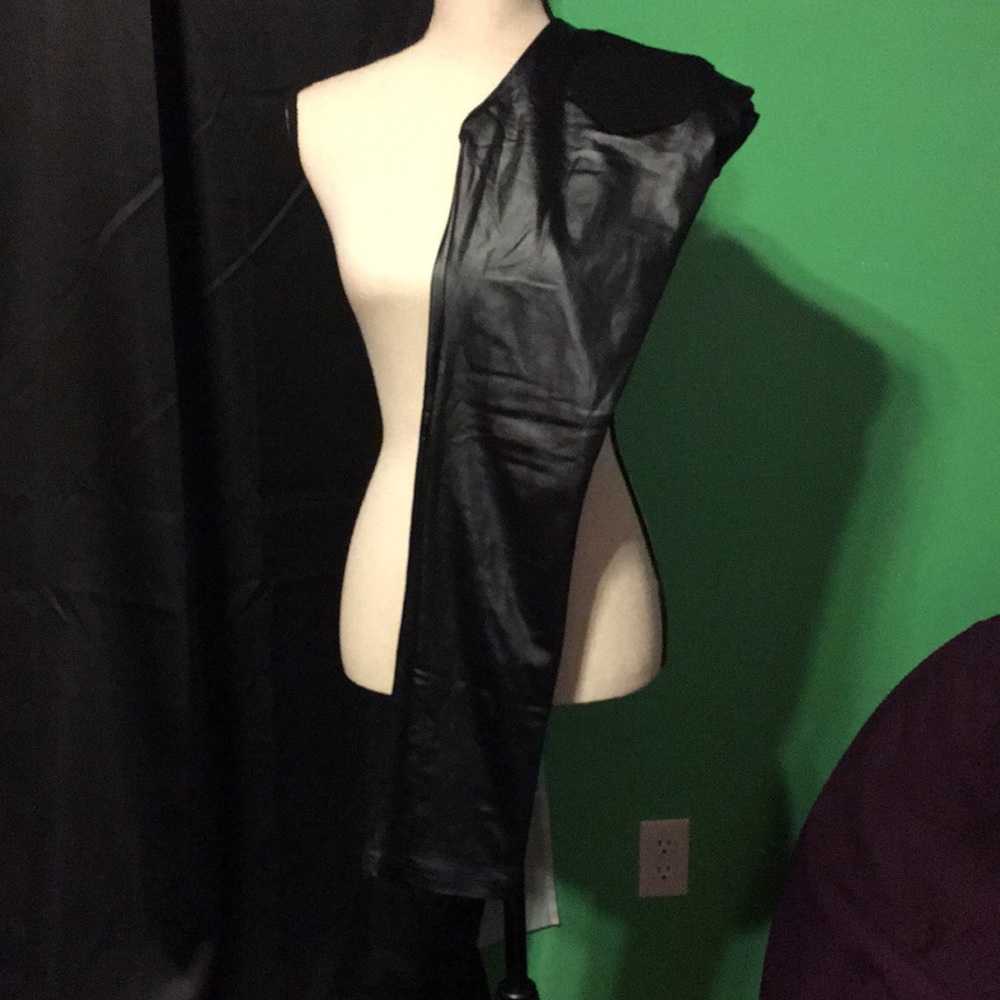 Black leathery material leggings